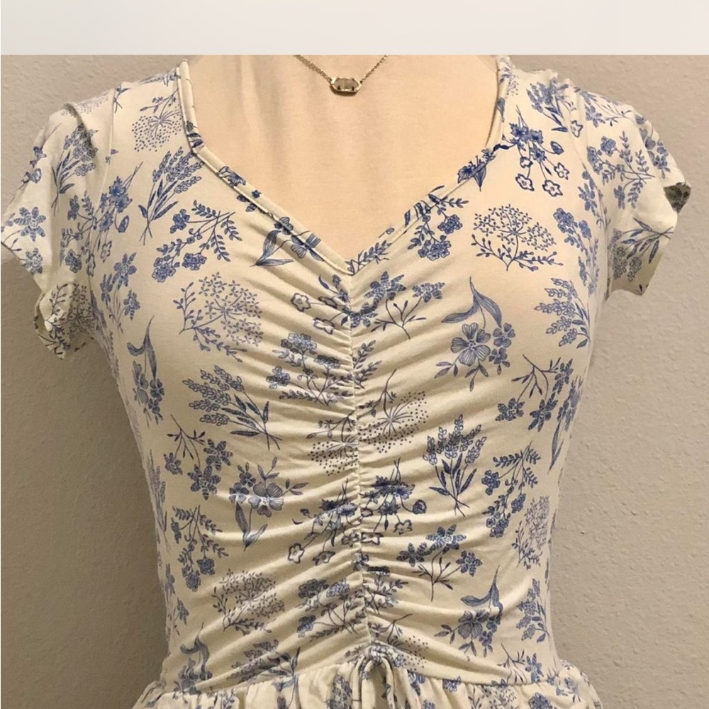Cute blue and white floral print dress with a ruched waist and ties